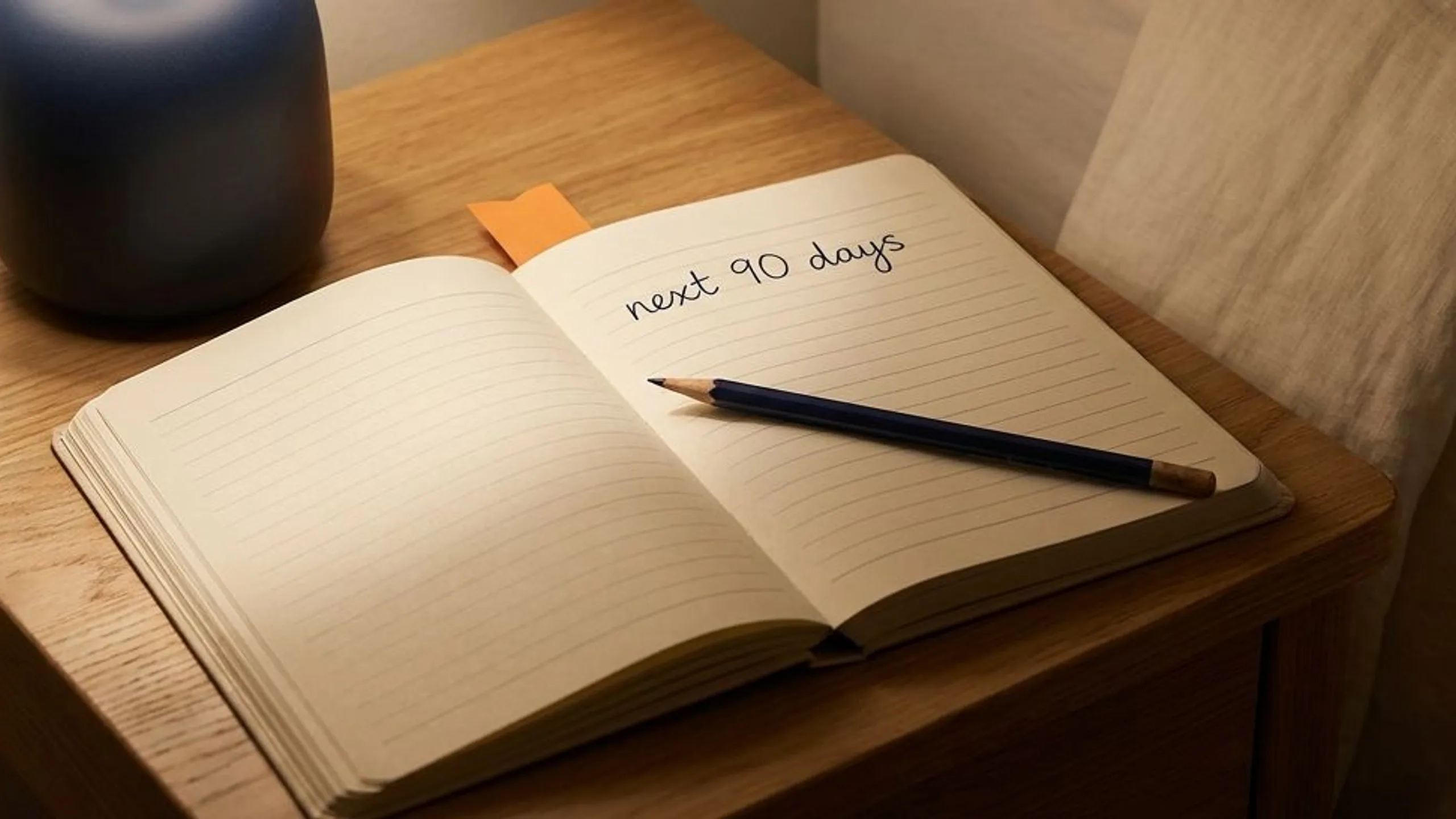 Open notebook on a nightstand with a single reflective sentence for is real estate passive income